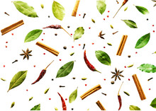 Flying Spices Bay Leaf, Red Chili Pepper, Anise, Cinnamon Sticks Isolated On A White Background. Pattern.