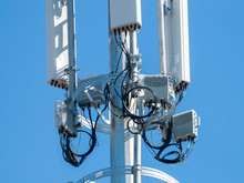 Close-up Of Telecommunications Tower With Equipment For Mobile Signal And Internet Transmission