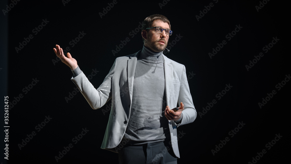 Business Conference Stage: Caucasian Visionary Startup CEO Presents New Product, Does Motivational Talk Science, Technology, Entrepreneurship, Development, Leadership. Black Background  - obrazy, fototapety, plakaty 
