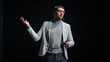 © Gorodenkoff - Business Conference Stage: Caucasian Visionary Startup CEO Presents New Product, Does Motivational Talk Science, Technology, Entrepreneurship, Development, Leadership. Black Background