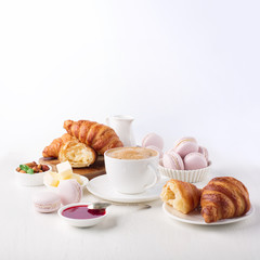 Wall Mural - Fresh delicious breakfast with coffee and  croissants