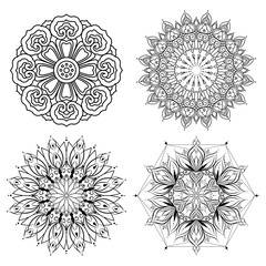 Wall Mural - Set of mandalas for coloring isolated on white background. Decorative round ornaments. Anti-stress therapy patterns. Henna tattoo design. Yoga logos, backgrounds for meditation poster.