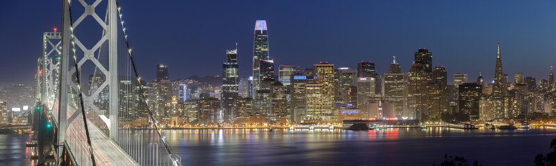 Wall Mural - Panoramic Views of San Francisco Bay Bridge and Waterfront at Night. Yerba Buena Island, San Francisco, California, USA.
