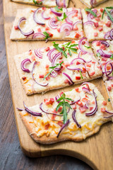Wall Mural - Flammkuchen - Traditional French dish tarte flambee cream cheese, bacon and onions