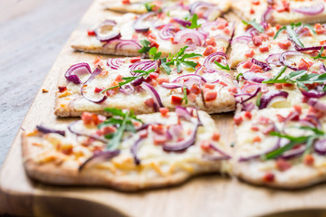 Wall Mural - Flammkuchen - Traditional French dish tarte flambee cream cheese, bacon and onions
