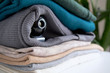© Sergey Privalov - Webcam hidden in a stack of clothes for covert surveillance of the house. Surveillance and security systems. Smart House. Espionage. Hidden camera for watching