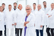 © ASDF - large group of people in white coats standing together.