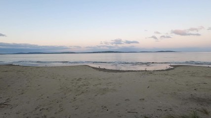 Wall Mural - dusk on the beach in Tasmania on a chilly autumn day in Kingston Beach