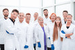 © ASDF - large group of medical researchers standing together