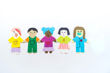 Celebration of bringing people together from all over the world Child makes a paper craft hands. Rainbow Flag Day.