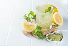 Green Matcha Lemonade On White Background, Copy Space