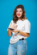 © Yarkovoy - Smiling girl with a mobile phone in her hands