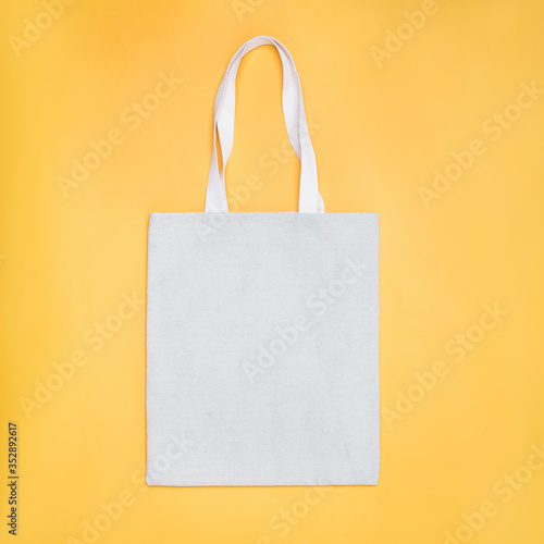 Download Eco Cotton Tote Bag Mock Up On Yellow Background Buy This Stock Photo And Explore Similar Images At Adobe Stock Adobe Stock PSD Mockup Templates