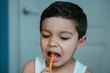 © LIGHTFIELD STUDIOS - cute, diligent boy brushing teeth in bathroom