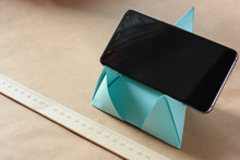 Hand Made Smartphone Holder From A4 Cardboard. Origami. DIY. Step-by-step Photo Instructions. Final Look After 47 Steps. Horizontal Fixation