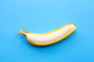 Banana on blue background. Copy space