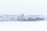 Fototapeta Londyn - Winter in Östersund: View of the city from the island