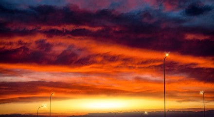 Wall Mural - dramatic landscape of cloudy sky during sunset