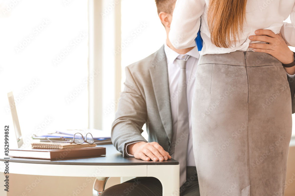 Boss molesting his secretary in office