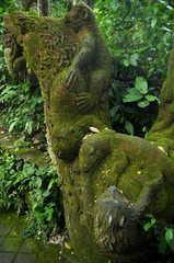 Art sculpture and carved antique deity angel god of hindu statue balinese style in Mandala Suci Wenara Wana or Ubud Sacred Monkey Forest Sanctuary at Ubud city in Bali, Indonesia