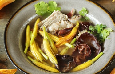 Poster - Asian soup with daylily flowers (golden needles), woody ear mushrooms and pork. Chinese cuisine. young daylily buds, edible flowers, foraging. daylily recipe