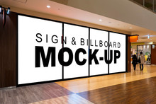 Mock Up Blank Billboard On Glassy Showcase In Shopping Mall