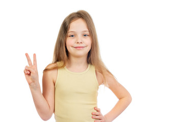 Wall Mural - Young cute smiling  girl with long light brown hair shows victory sign isolated on white background