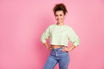 Wall Mural - Portrait of her she nice-looking attractive lovely pretty charming content slim cheerful cherry girl wearing green crop top posing isolated over pink pastel color background