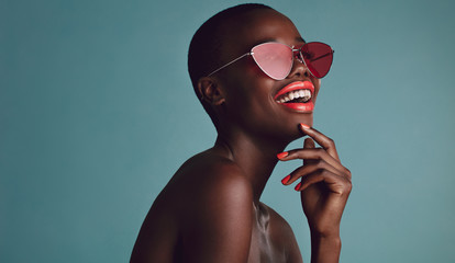 Wall Mural - African female model with funky sunglasses