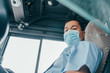 Pandemic coronavirus 2020. Quarantine. Young hispanic bus driver