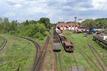 
Empty railway wagons stand on loading tracks