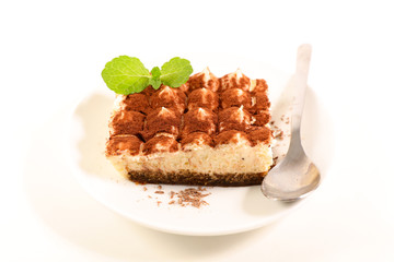 Wall Mural - tiramisu cake on white background