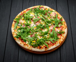 Wall Mural - Prosciutto and Arugula Pizza with Marinara Sauce