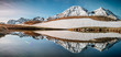 Panorama of Gavarnie with mirror reflection in a lake - French Pyrénées