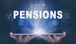 © Duncan Andison - Businessman holding a computer tablet display projecting a Pensions concept.