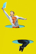 Office man jumping high. A person jumping throught blue paper's cutouts on yellow background. Dream, paperworld. Cutout of paper. Contemporary colorful and conceptual art collage with copyspace.