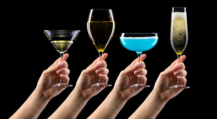 Poster - Set of hands holding cocktails isolated on black background