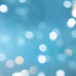 © Vladimir - Christmas light background.  Holiday glowing backdrop. Defocused Background With Blinking Stars. Blurred Bokeh.