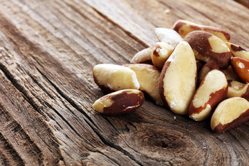 Canvas Print - Brazil nuts on vintage background. unshelled Bertholletia healthy vegetarian food