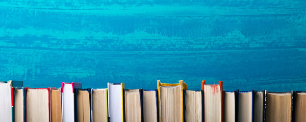 Books on wooden desk table and abstract background. Education background. Copy Space. Back to school.