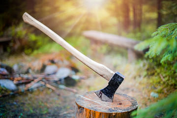 Sticker - axe cut in the chopping block, forest green background. lumber jacks work tool