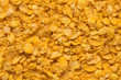 © Damian Pawlos - Cornflakes texture close up. Golden Cereal as a background