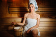 © eldarnurkovic - Young woman relaxing inside spa sauna room.Enjoying relaxing vacation day doing body treatment in luxury resort hotel.Beauty therapy,self care,relax,recreation and wellness lifestyle concept