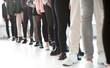 canvas print picture - close up. group of young professionals standing in line