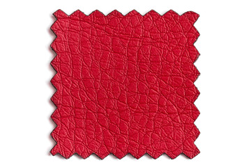 a sample of red factory leather in macro cut on a machine tool. structural, textured leather in a cr