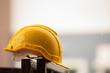 Raindrops on a yellow helmet, heavy rain, storm, construction helmet, construction site