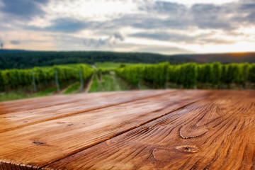 Canvas Print - A table in a vineyard in a beautiful holiday sound with the sunset giving an amazing mood