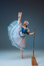 Dreamworld. Young And Graceful Female Ballet Dancer As Cindrella Fairytail Character On Studio Background. Art, Motion, Action, Flexibility, Inspiration Concept. Flexible Ballerina In Inspired Dancing