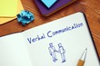 © Yurii Kibalnik - Career concept meaning Verbal Communication with phrase on the piece of paper.