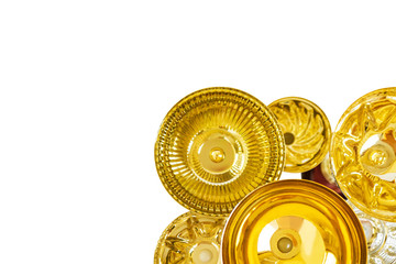 Golden sports cups on a white background, top view.